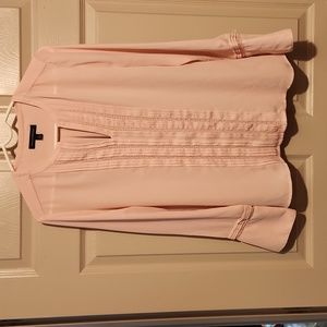Woman's soft muted pink top